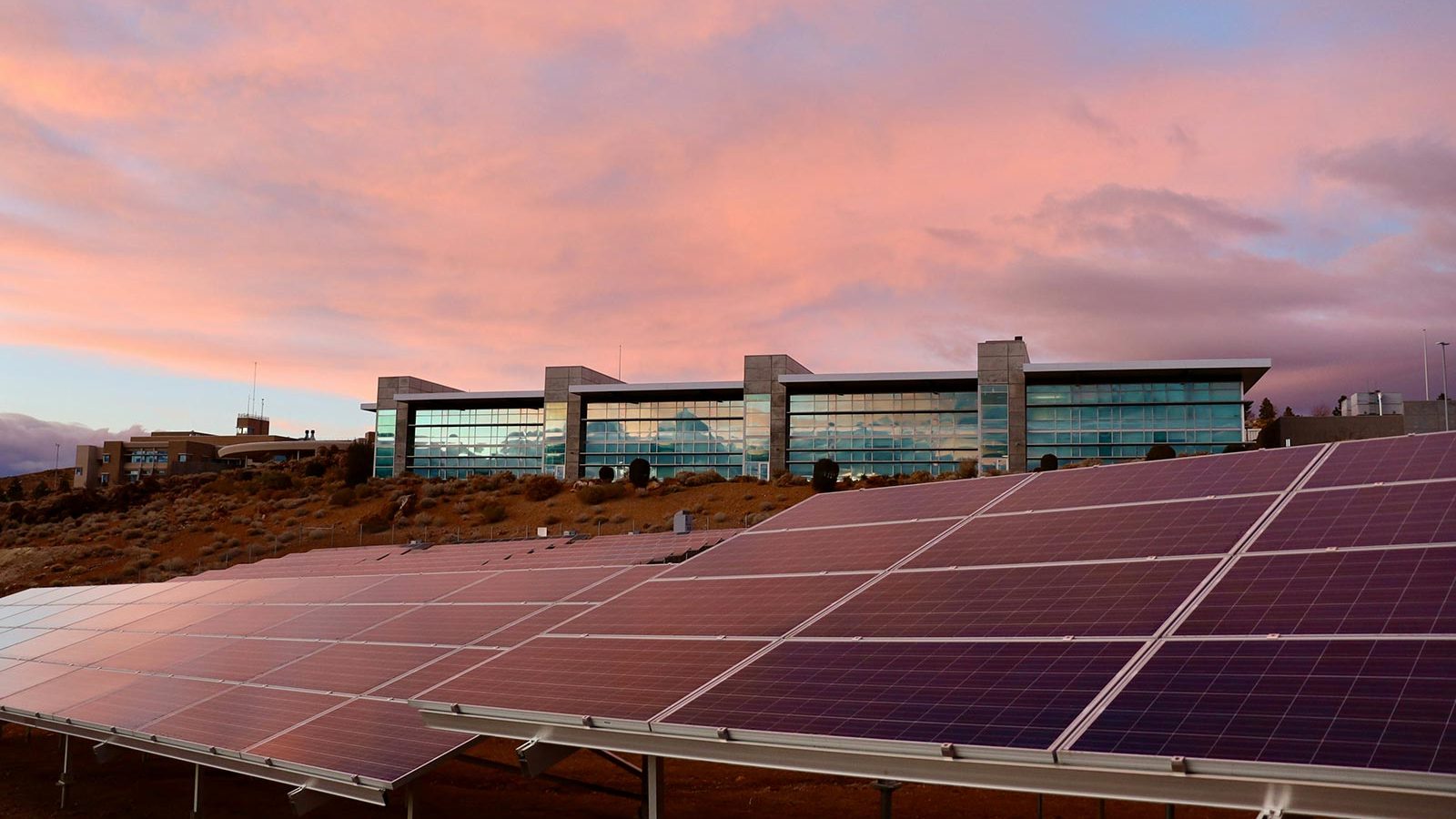 AES Commercial Solar Solutions for UK Businesses Image of a ground installed commercial solar panel array