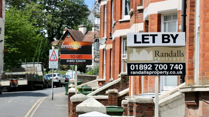 Road with properties with letting signs